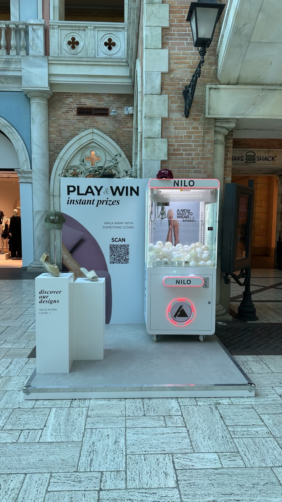 Branded claw machine stand at Mercato Mall